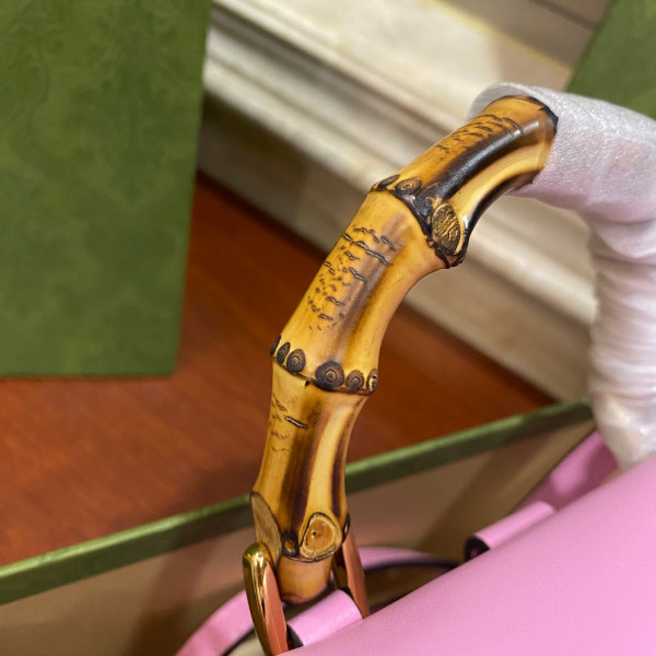 G*u*i bamboo mini handbag