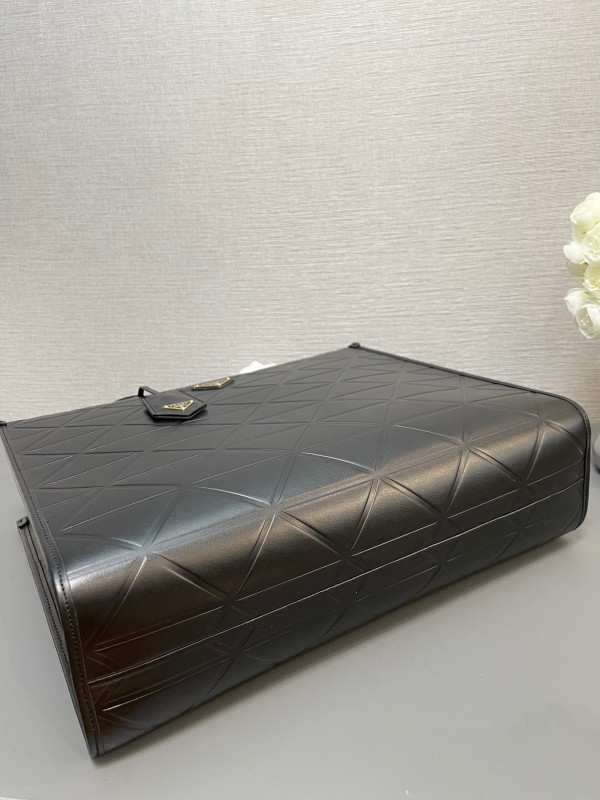 Pra*a symbole large leather bag $ 4,200